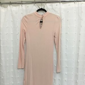 Long sleeve sexy below knee dress.